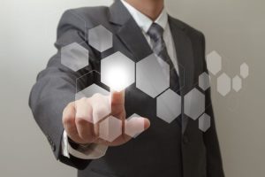 hand-pushing-on-touch-screen-interface_z1pf5KBu