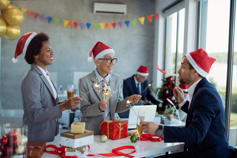 playful-business-colleagues-having-fun-christmas-party-office