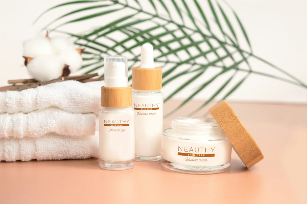 white and brown plastic bottles on white textile