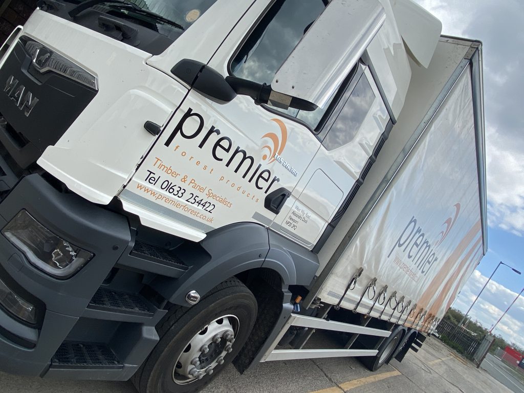 A branded Premier Forest Products van.